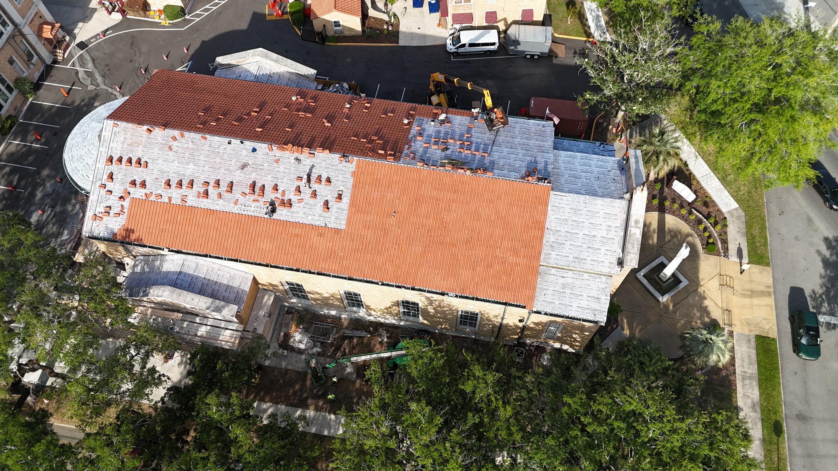 Drone aerial view of a completed tile roof installation by JT Brothers